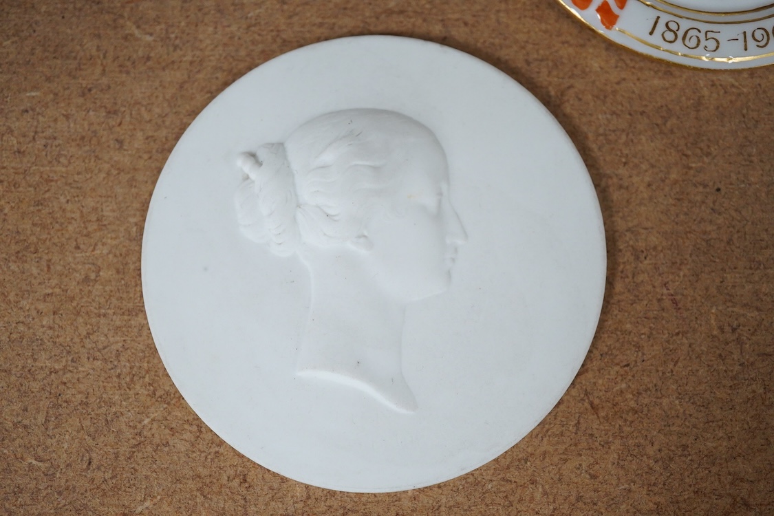 A pair of Copenhagen biscuit porcelain circular plaques, of Night and Day, two smaller French portrait plaques of Emperor Napoleon III and Empress Eugenie , and a Royal Copenhagen Princess Marie commemorative plaque, c.1